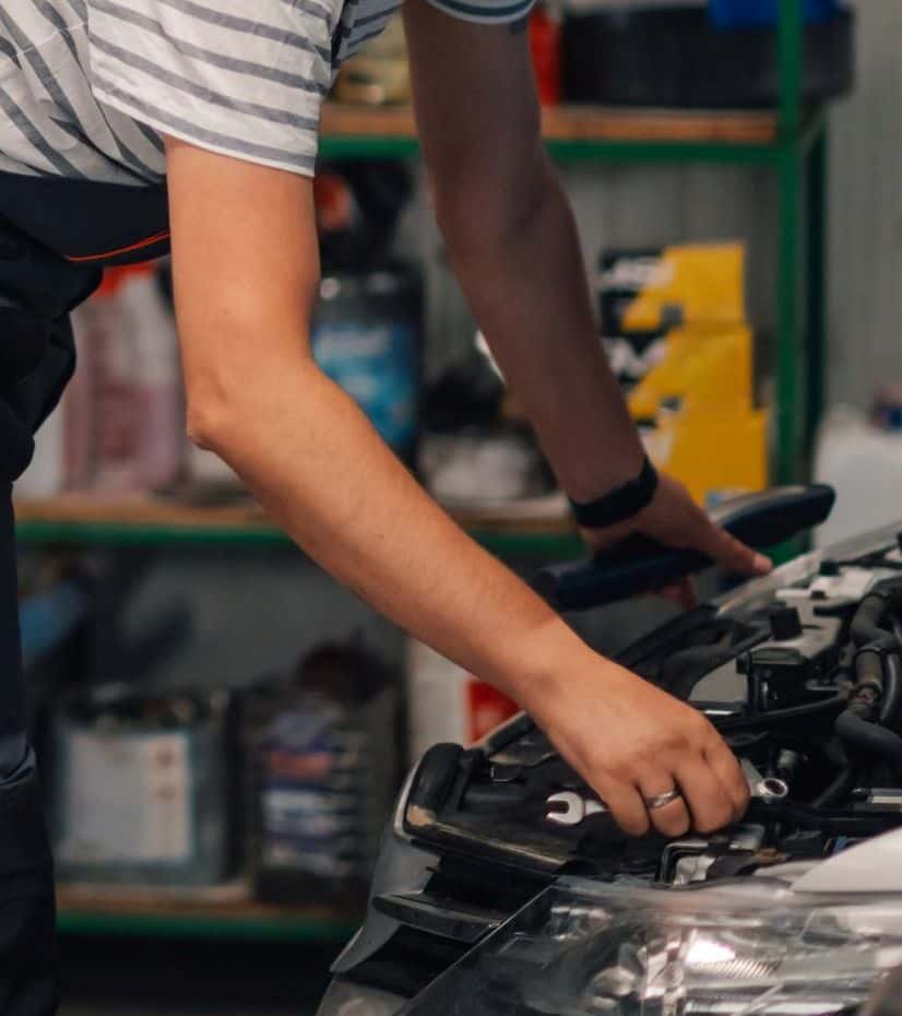 Servicing vehicle at Greens Garage Suffolk, professional car repair and maintenance services.